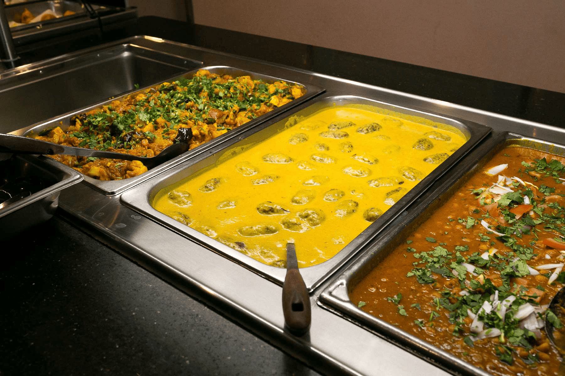 Affordable Indian catering menu with vegetarian dishes and sharing platters